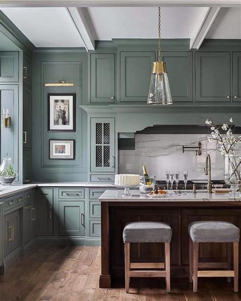Sage Green Kitchen With A Wood Island From Traditionalhomebradley