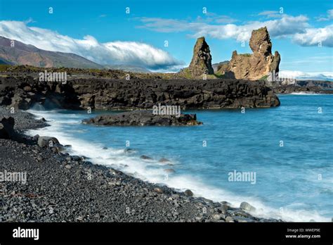 Lóndrangar Impressive Rock Formation On The West Shores Of Iceland On A