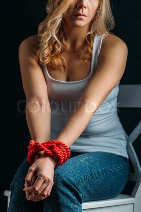 cropped view of victim with tied hands stock image colourbox