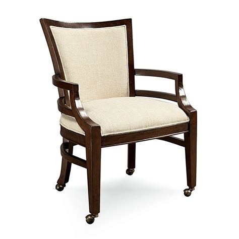 The design resembles workspace chairs. Latitudes Dining Chair with Casters at Hayneedle