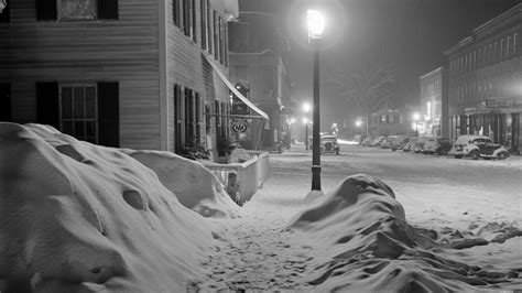 2560x1440 Street Night City Snow Winter Wallpaper