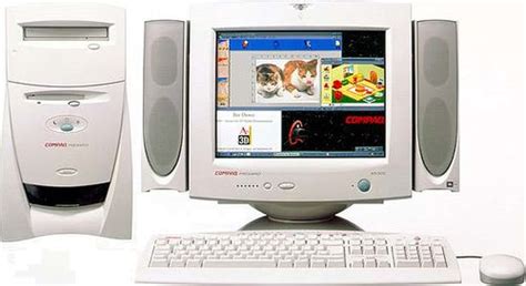 A Desktop Computer With Two Speakers And A Keyboard