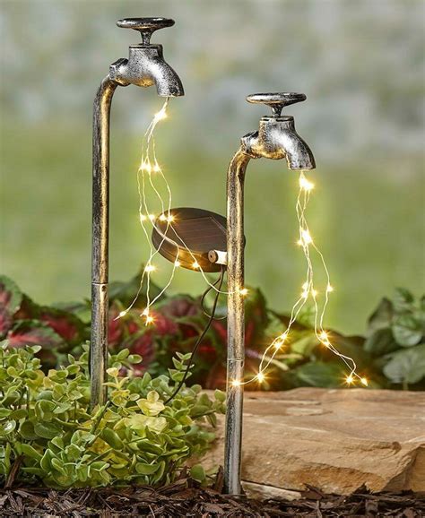 To create a moss base within the fairy garden try getting some growing tips from moss gardening: Solar Garden Stakes Water Faucet Fairy Light Yard