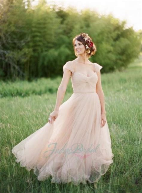 The jewel neckline bodice features cap sleeves. JOL240 Blush Pink Colored Cap Sleeves Flowy Tulle Wedding ...