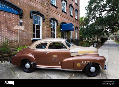 Vintage police car in front of the Metropolitan Police Department