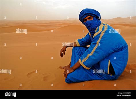 Young Berber In Traditional Dress In The Sahara Desert In Morocco Stock