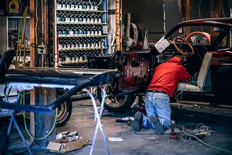 Mechanic Fixing Car In Garage Adult Auto Automobile Repair Shop