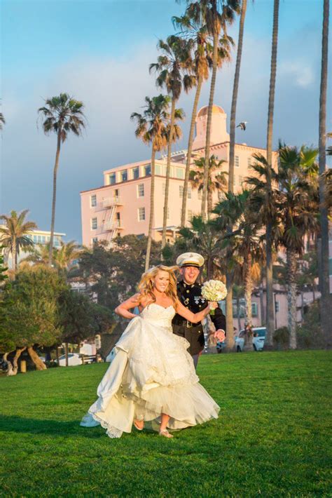 Fun Shot Of Runaway Bride And Groom Outside Of La Valencia Hotel In La