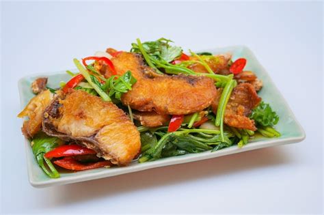 Premium Photo Stir Fried Sea Bass With Celery