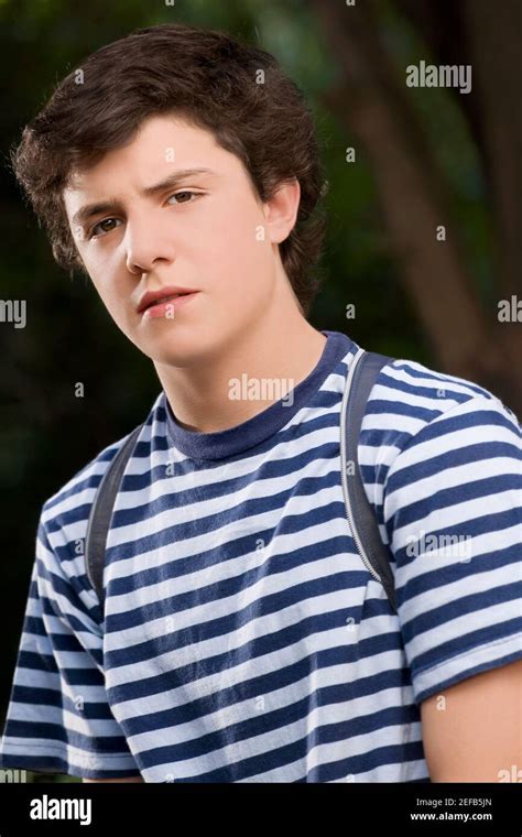 Portrait Of A Schoolboy Looking Serious Stock Photo Alamy