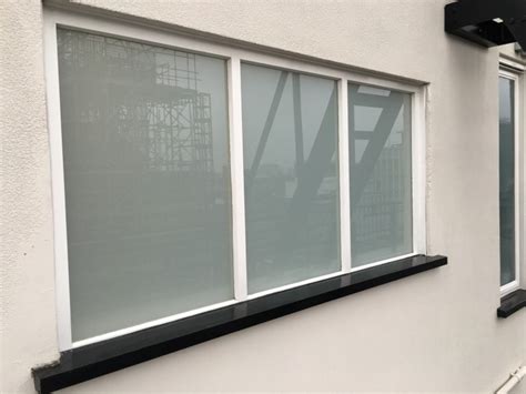 White Laminated Safety Glass Supplier And Installer In South West London