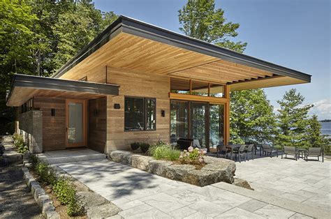 Modern Lakeside Cottage With Douglas Fir Wood Ceilings And Large Roof