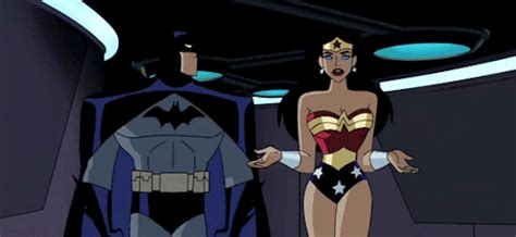 The Animated Batman And Wonder Woman Are Standing Next To Each Other