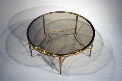 Coffee tables can be used to display a small stack of your favorite books, a vase a fresh flowers or a beautiful centerpiece bowl. Antiques Atlas - Large Brass Round Coffee Table
