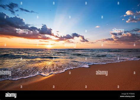 Colorful Ocean Beach Sunrise Stock Photo Alamy