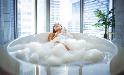 Premium Photo Beautiful Woman Taking Hot Bath In A Luxury Bathroom
