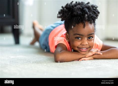 Cute Little African American Girl Smiling And Laughing Stock Photo Alamy