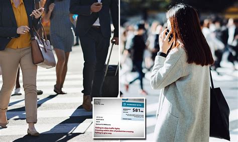 Calls For Pedestrians Who Cross The Road While Looking At Their Phones To Be Fined 200