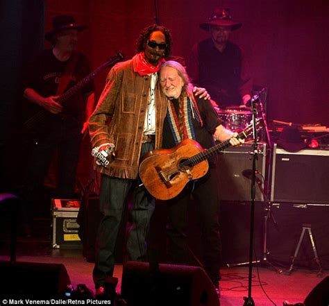 Willie Nelson Receives Ultimate Christmas Sweater From Snoop Dogg