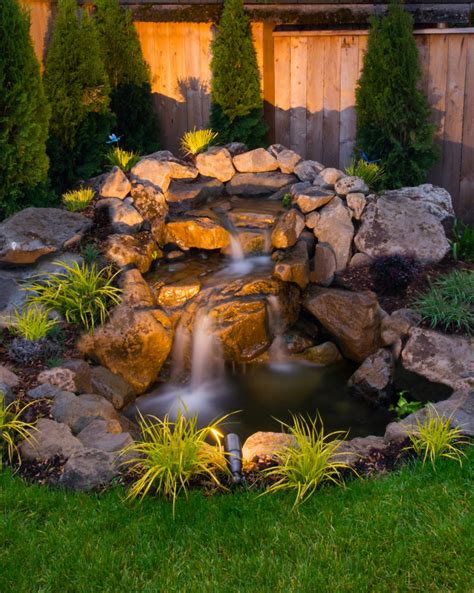 #gardenfeature water feature, landscape design, lighting. 75 Relaxing Garden And Backyard Waterfalls - DigsDigs