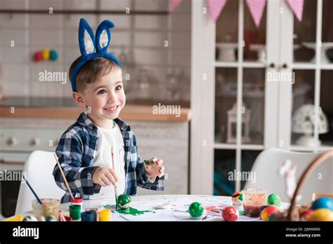 Portrait Happy Little Boy Painting Easter Eggs Stock Photo Alamy