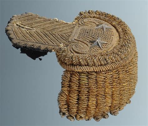 Also spelt epaulet) is a type of ornamental shoulder piece or decoration used as insignia of rank by armed forces and other organizations. PAIRE D'ÉPAULETTES DE GÉNÉRAL DE BRIGADE, MODÈLE AN XII ...