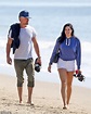 Josh Duhamel and his girlfriend Audra Mari smile side by side on a ...