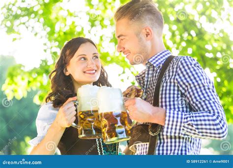 german couple in tracht drinking beer stock image image of alcohol couple 58912261