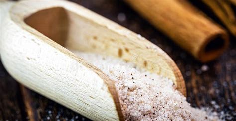 Wooden Measuring Spoon With Powdered Cinnamon And Refined Sugar Used