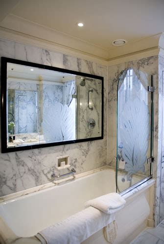 You might found another bathroom tv mirror higher design ideas. Bathroom mirror TV above marble bathtub