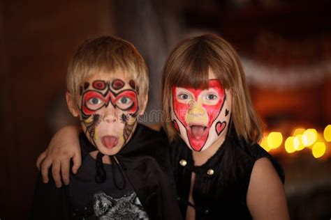 Funny Scary Children With Painted Faces Concept Of Halloween Stock