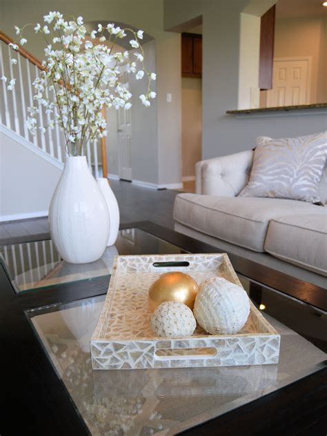 Coffee table staging ideas. Simple tray with miss matched spheres, two