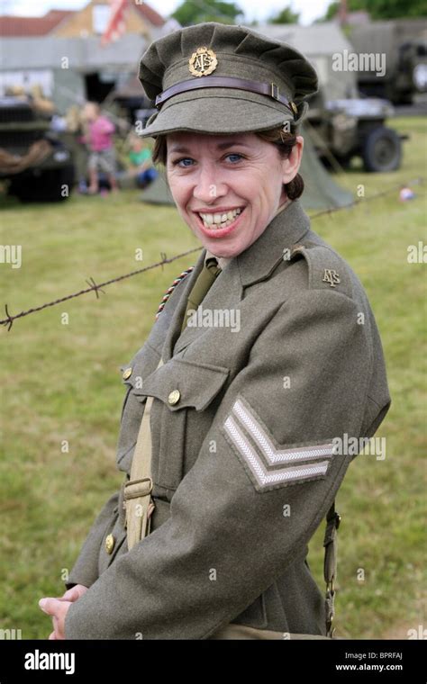 A Ww2 Reenactment Female Member Wearing The Uniform Of An Ats Corporal