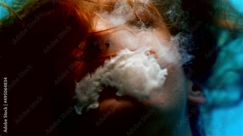 Underwater Fantasy Woman Is Floating In Depth And Smoking White Smoke