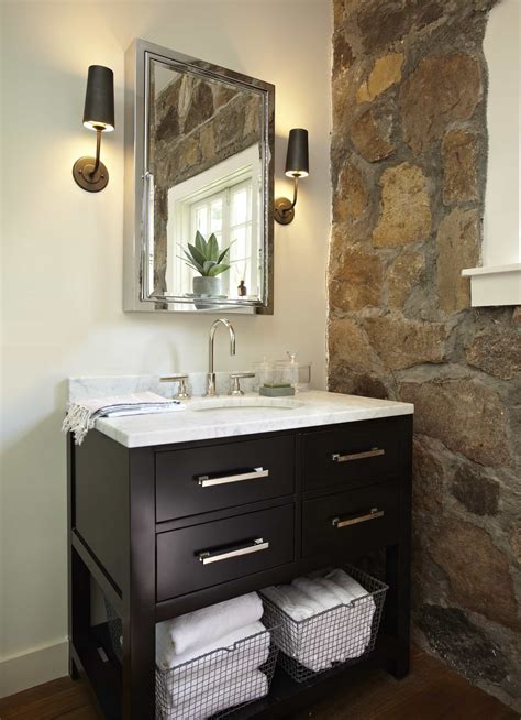 Bathroom With Stone Accent Wall And Contemporary Wood Vanity