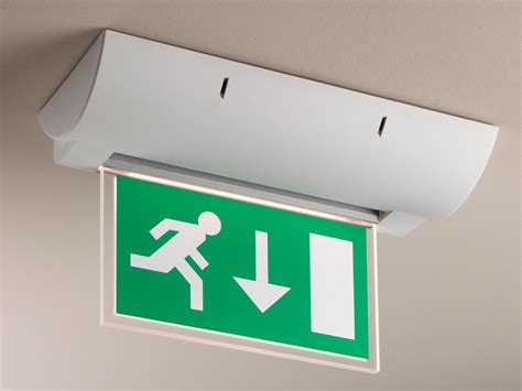 Versatile exit sign can be mounted on walls or ceilings