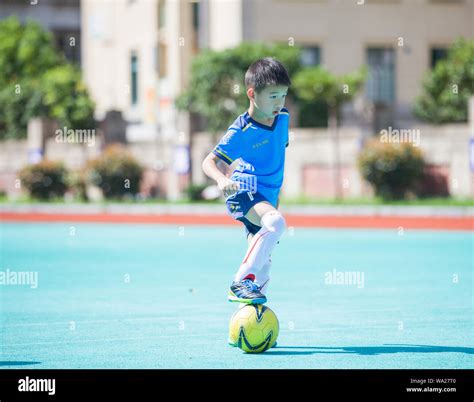The Children Playing Football Stock Photo Alamy