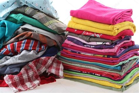 Pile Of Messy And Ironed Clothes — Stock Photo © Photographeeeu 36853943