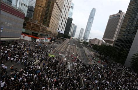 Thousands Of Protesters Paralyze Hong Kongs Financial Hub Over
