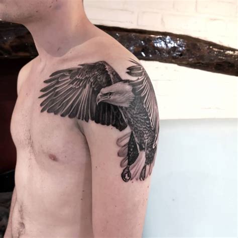 Black And Grey Eagle Tattoo Done On The Shoulder