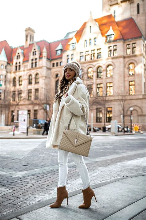Fashion Blogger Mia Mia Mine Wearing An All White Winter Outfit With A