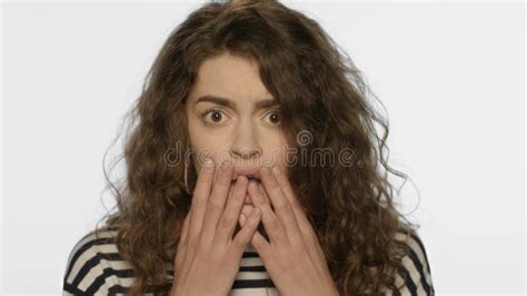 Afraid Woman Face With Open Mouth Touching Face With Hands On Yellow