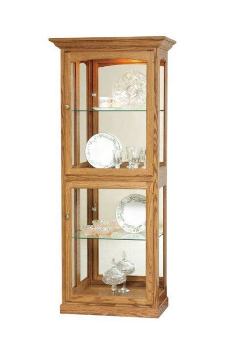 Isn't a curio cabinet the same as a china cabinet? Amish Wood Curio Cabinet from DutchCrafters Amish Furniture