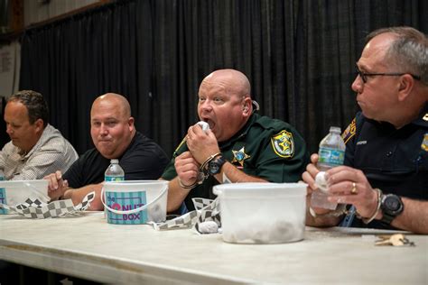 Local officers compete in doughnut eating contest at Lake County Fair