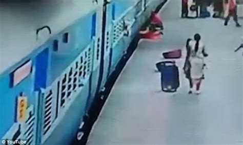 Video Shows Woman Dragged On To The Tracks And Killed While Getting Off