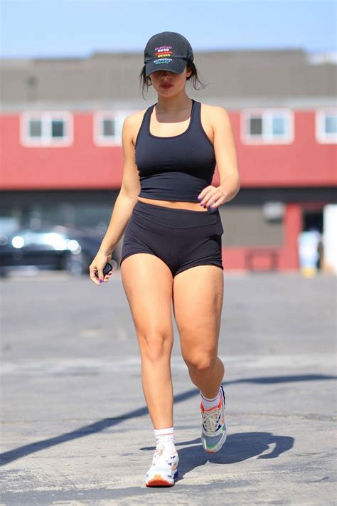 addison rae puts on a leggy display in black lycra shorts with matching tank top as she hits her