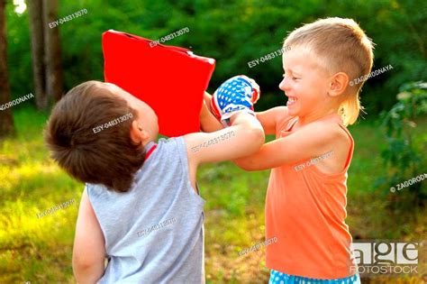 Portrait Of Two Boys In The Summer Outdoors Stock Photo Picture And