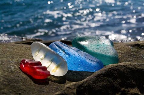 ussuri bay in russia has turned liquor bottles into colorful glass “pebbles” and it s breathtaking