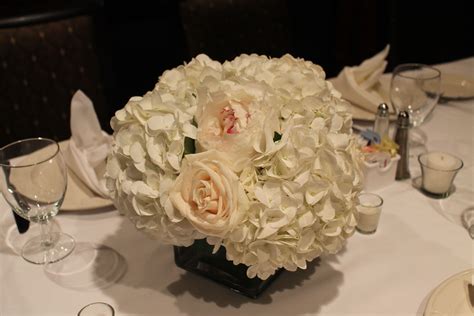 Wedding Centerpiece Of White Hydrangeas Roses And Peonies Wedding