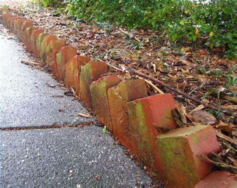 This diy project makes a great weekend project. How to Create Landscape Edging Use Angled Bricks | Hunker ...